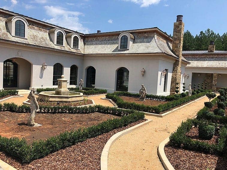 Boxwood for sale. An estate in North Carolina used Green Mountain Buxus InstantHedge to create this classic French Provincial look.